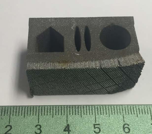 Figure 5: DMLS printed sample for microstructure analysis. Ruler unit is cm.