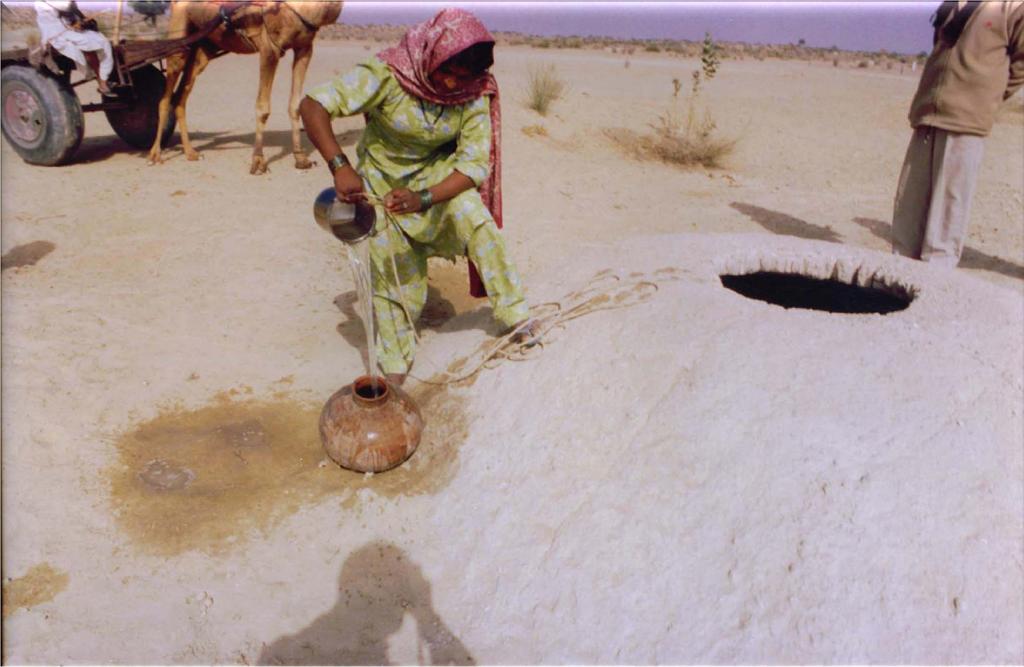 Woman fetching water from a