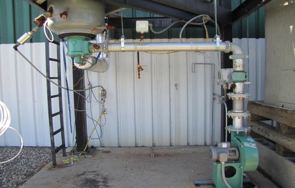 40 Figure 3.9: Fuel and air inlets, air pump, and thermal gas flow meter. Natural gas is initially used to ignite the burner and then transition to the desired flow rates of syngas begins.