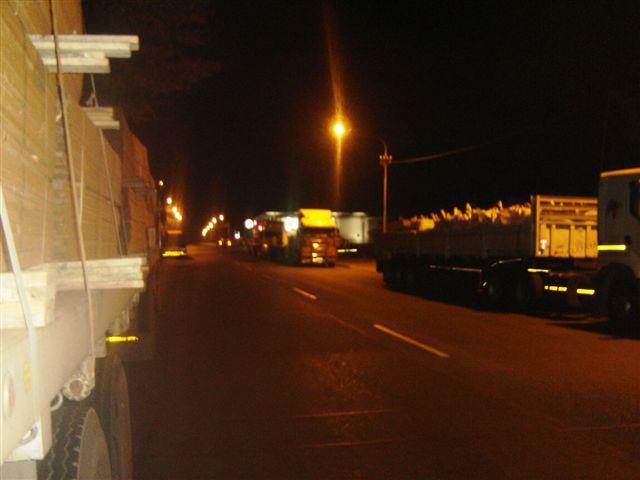 the following photos. Figure 5.5: Photos of Trucks parking in Volksrust Source: K.