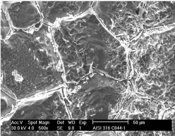 146 A ditched type microstructure noticed in the specimen cladded at high heat input (6.81 KJ/mm) condition after Huey s test is shown in Figure 7.6. Figure 7.6 SEM photomicrograph of high heat input specimen (6.