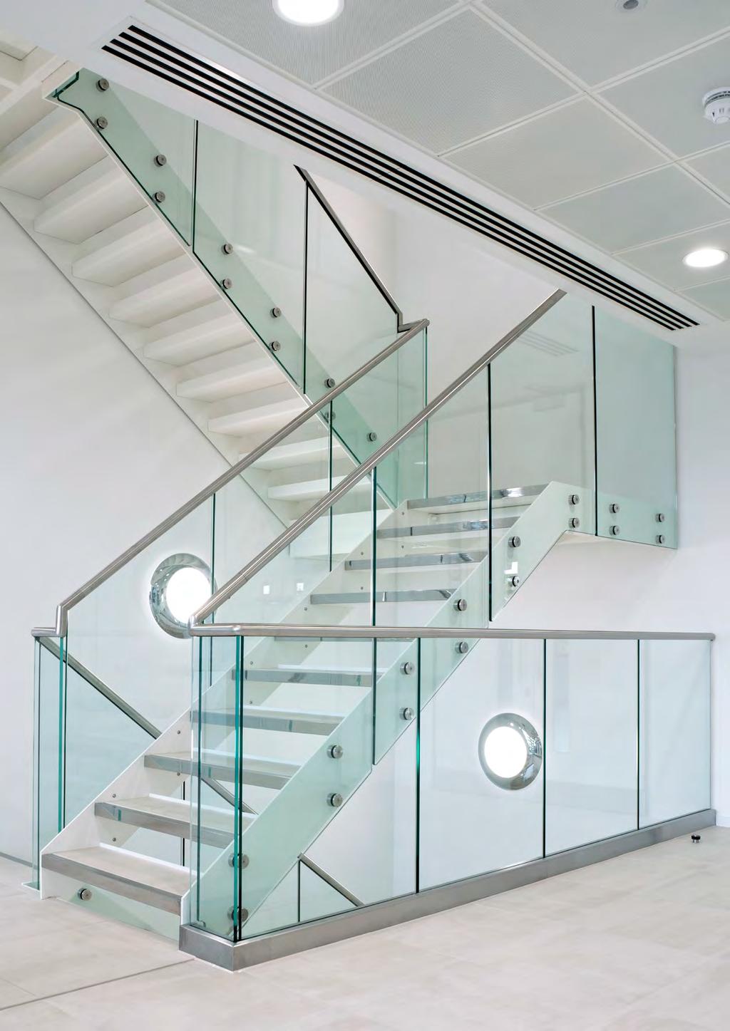 uk > 15mm clear toughened structural glass with a combination of base fixing