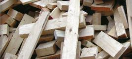 Tree trunks and round logs Chip board, pallets and