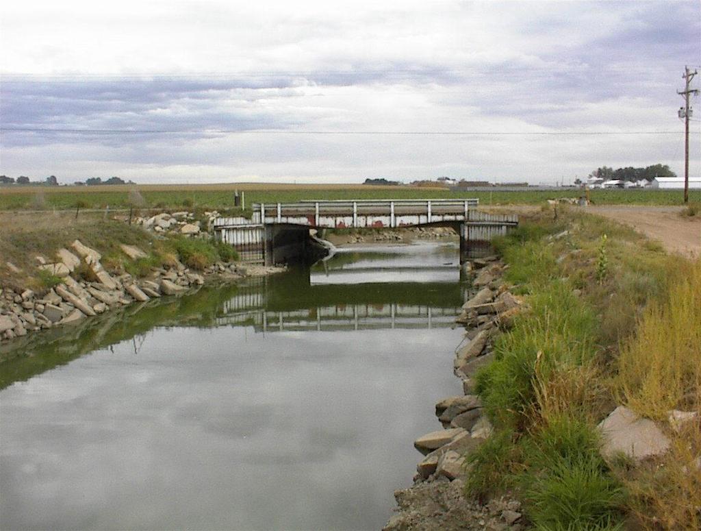 The crossing at Colorado & Southern Railroad consists of a 4'H x 8'W reinforced concrete box culvert. At this location, the railroad overtops at a depth of approximately 7.