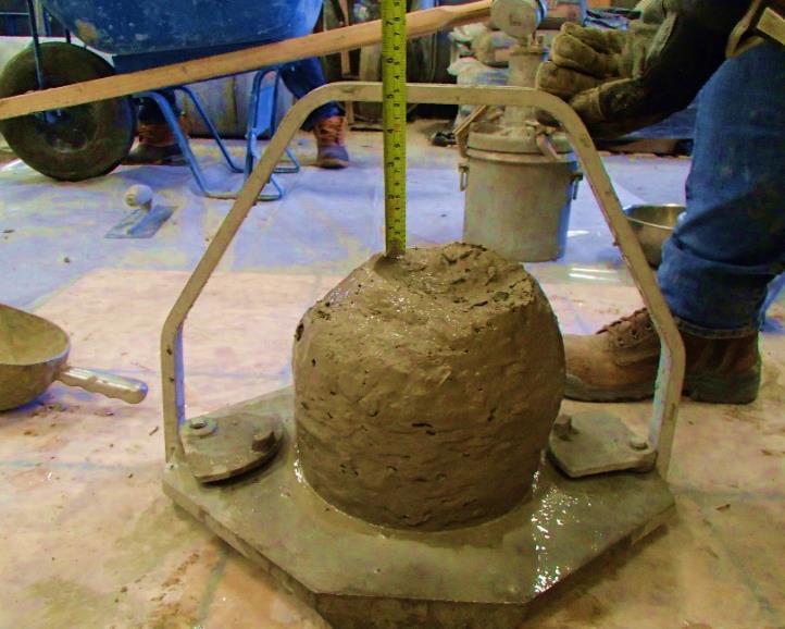 4.5.2 Constructability 4.5.2.1 Slump/Spread Either a slump or spread test was performed on every concrete batch depending on qualitatively observing the flowability in each concrete mixture as it was being mixed.
