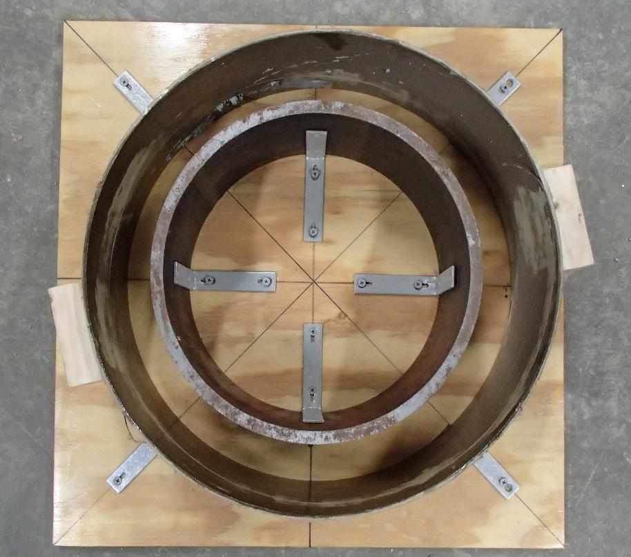 was used to fabricate a concrete ring that is 6 inches high with an inside diameter of 12.75 inches and an outside diameter of 18 inches.