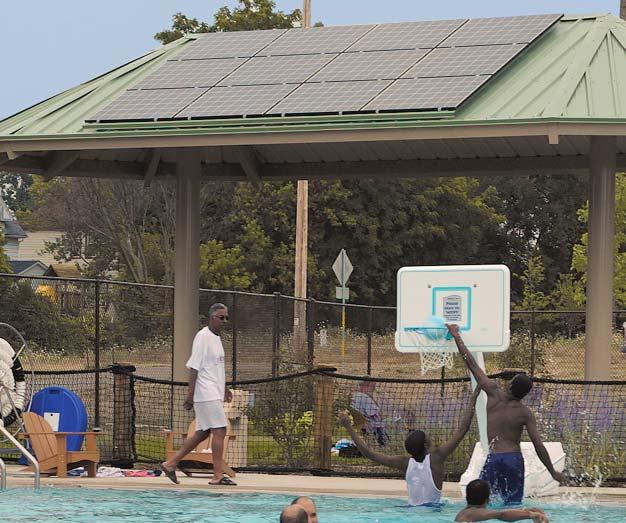 S o l a r p r o j e c t s Goodman Pool MGE s latest solar PV demonstration project is installed on the shade canopy for the toddlers sandbox area at Madison s Goodman Pool (photo left).