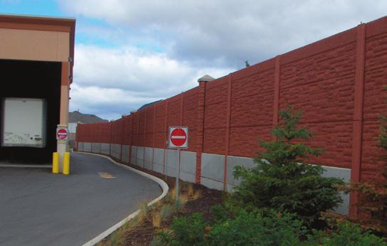 In most cases, it is desirable to locate both the retaining wall and the noise barrier as close as possible to the property