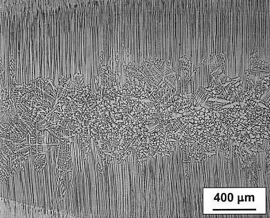 204 WELD METAL SOLIDIFICATION II: MICROSTRUCTURE WITHIN GRAINS Figure 8.8 Electron beam weld of single crystal of Fe 15Cr 15Ni with sulfur showing transition from columnar to equiaxed dendrites.