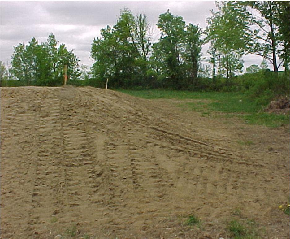 sand or sandy loam fill material with a preferred percolation