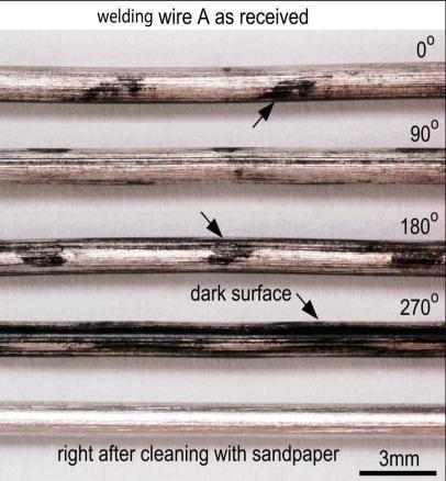 POROSITY CAUSED BY WELDING WIRE B AND ITS ELIMINATION In view of the porosity caused by the partially dark surface of welding wire A, a brand-new spool of welding wire with a shiny surface was used
