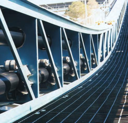 THE PIPE CONVEYOR The conveyor resembles a conventional troughed conveyor at its tail end where the material is