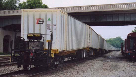 Figure 3-12 Intermodal Marine Containers for Grain Hauling on Modified Chassis The North Dakota Department of Transportation has also initiated a study of containerized grain service on the