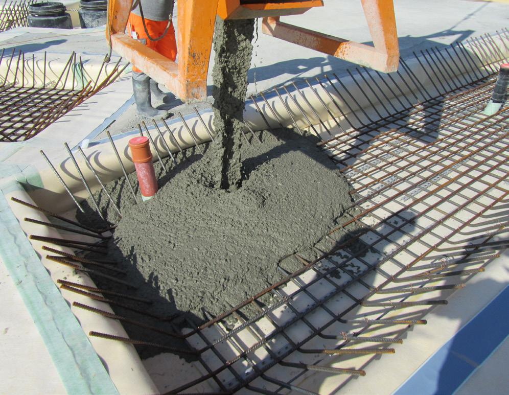 The membrane is then applied into the adhesive bed evenly, creating a durable bond of the membrane system onto the existing hardened concrete