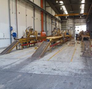 Mackay Facility: Track Frame Overhaul Area: a) approximately 22m x 22m of dedicated undercarriage space Track Bay Area: a) 3 track benches b) 3 bolt up benches c) 2 track press d) 1 field press Idler