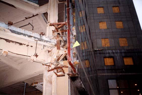 Figure 7 Panel damage showing sub-frame In spite of a complete burnout, fire damage only reduced the structural strength of the affected floors; no structural failures because of fire were observed.