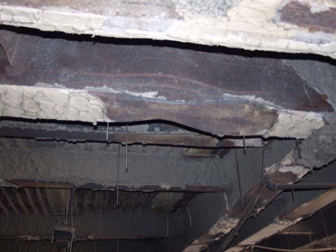Figure 9 - Floor framing damage from fire in WTC 5 The World Trade Center Towers As previously stated, there were no masonry elements in the towers or plaza office buildings.