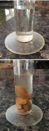 Measuring the Volume of Rocks Place 30 ml of water in a 100 ml graduated cylinder. Without spilling, add the rocks to the water.