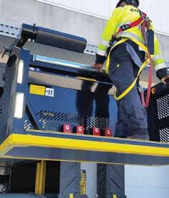 or heavy objects, a platform brings the operator to an appropriate working height, a belt extension brings the cargo to the conveyor.