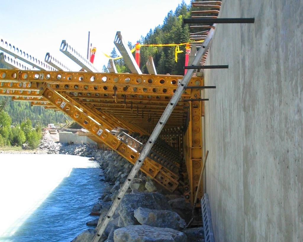 Picture 3 Cantilever Formwork Durability of the cantilever deck which will be subjected to rain, snow and freezethaw cycles in the Kicking Horse Canyon was a major concern for the Ministry.