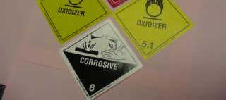 Labels correspond to the placards that must appear on bulk packaging, freight containers, transport vehicles or rail cars that contain a hazardous material.