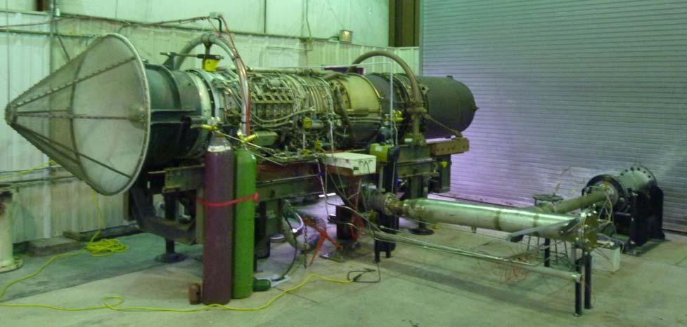 Phase I Progress Developed of Test Set up Test rig designed to simulate gas turbine combustor conditions Bleed air from a J-79 turbofan engine supplies high pressure, hot air for combustion Air flow
