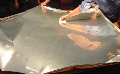 To form this surface, we use a aluminum plate that has deposited a highly reflective film called REFLECTECH, which was developed by the company ReflecTech, Inc.