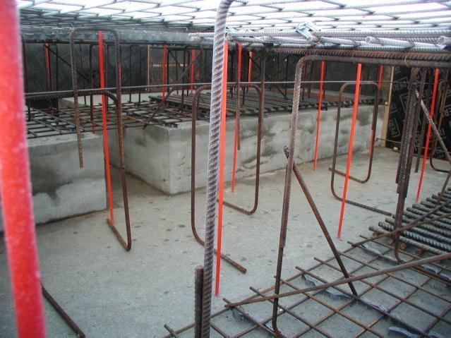 It provides ten areas of different reinforcement ratio as well as one strip foundation and two pile heads beneath the slab.