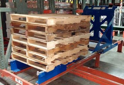 Following the simple instructions that are embedded on the device the order selector loosely aligns the pallet to the carriage and tips the pallet against it.