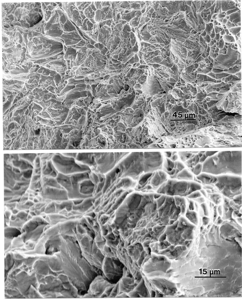 Figure 17. Low (a) and high (b) magnification SEM images of tensile specimen fracture surfaces.