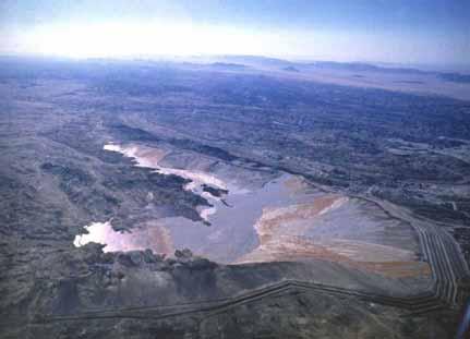 Reducing Evaporation Losses After the depletion of the large tailings water inventory in 1987 it became clear that permanent water savings could only be achieved by a new approach to tailings and