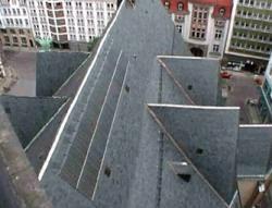Integration of Photovoltaic roof integration Nikolaikirche in Leipzig church, build in the middle ages, saddle roof, slope 60 degrees 4,8 kwp, 44 monocristalline modules (22