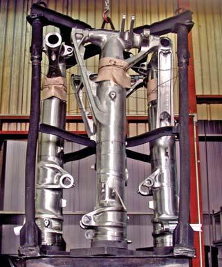 Fig. 8. Landing-gear load being assembled for hardening and oil quenching in a vertical vacuum furnace (Photograph courtesy of Vac-Aero International) tend to reduce or eliminate this effect.