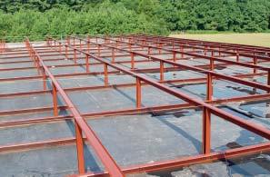 RETROFIT PURLIN ANGLE BRACING EXISTING STRUCTURAL RETROFIT COLUMN EXISTING ROOF DECK BASE CHANNEL EXISTING ROOF DECK OPTION 1 Option One utilizes a base channel that is attached to the joist or other