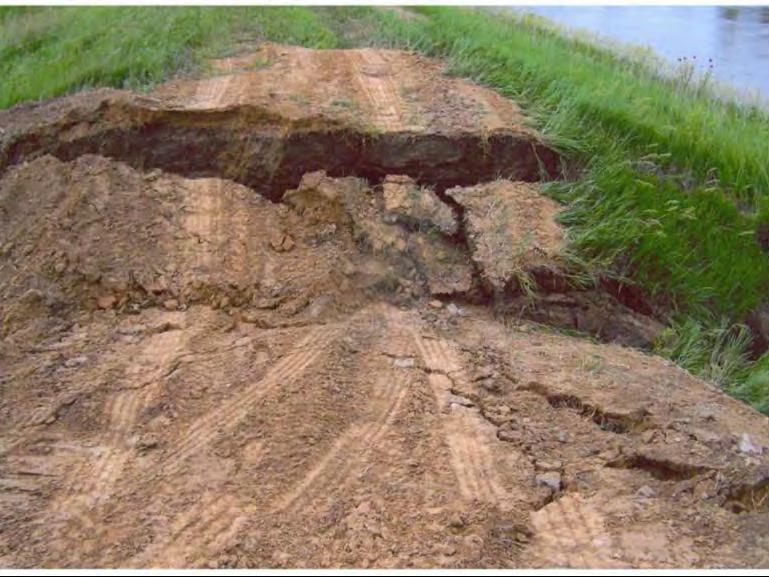 L575 - Levee collapses on itself