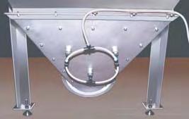 When the headroom is very low, a screw conveyor can be used to deliver material