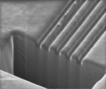 Focused Ion Beam (FIB) Micromachining Cross-view image: Pattern of 100 nm width, 200 nm depth Machining conditions: Accelerating voltage of 40 kv, current of 11 pa/cm 2
