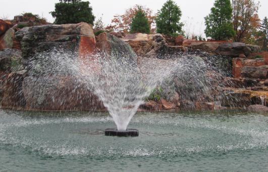 An example of a V pattern aerating fountain which gives you the best of both worlds: an aesthetically pleasing display and decent oxygen transfer simply because you are not wasting energy to spray