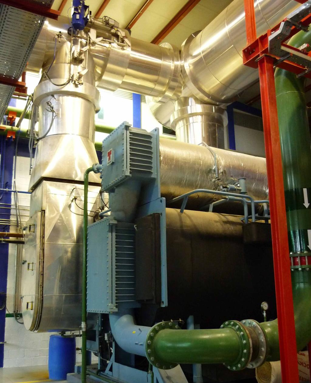 using the hot water obtained from the cogeneration engines.