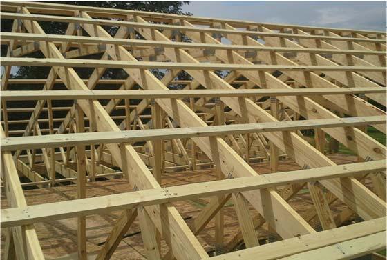 C. TRUSSES- 2 X4 PURLINS ON EDGE @ 24 O.C 2 16d EACH SIDE OF LAP FOR 8 O.C. TRUSSES- 2 X6 ON HANGERS @ 24 O.