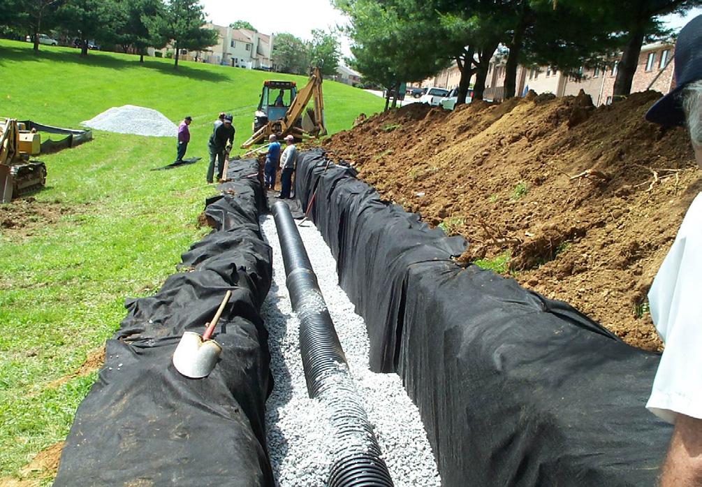 Important components of an Infiltration Trenches include: Roof leader or Downspout connection, a minimally sloping, continuously-perforated pipe (to distribute stormwater, allowing it to infiltrate