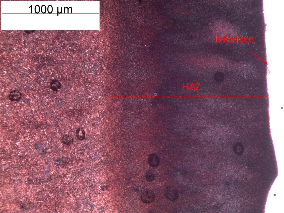 Figure 5.1.15: Microstructure of CPM-V steel revealing heat affected zone (HAZ) and interface between M2 and CPM-V steel.