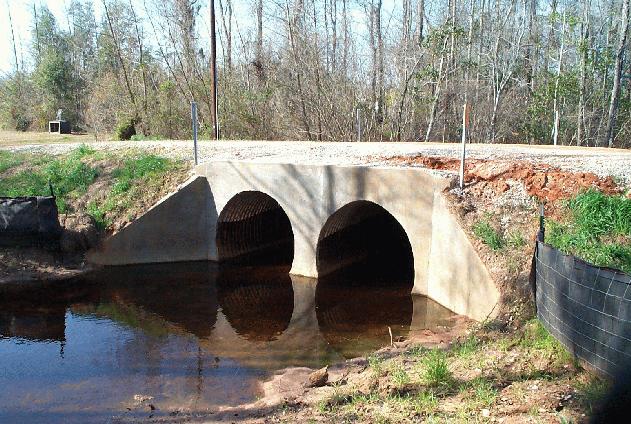 STRUCTURES IN WATER: CULVERTS Culverts carry water under roads to prevent disruption of traffic or erosion.