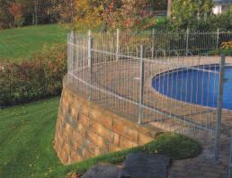 In addition, this unique retaining wall system allows for a mechanical connection with geogrid soil reinforcement, securing its placement between units and allowing for proper tension and maximum