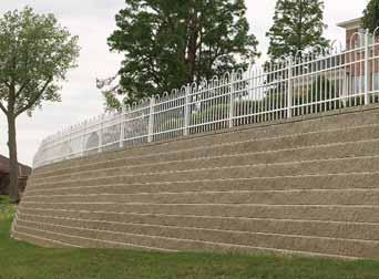 Water Application Fences/GuideRails There are several options for installing fences and guide rails on top of an Allan Block wall.