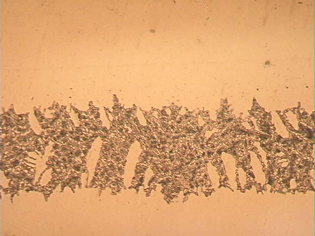 Possible dendrites Figure 64 Optical micrograph of a Ni-Zr brazed joint in In738 parent