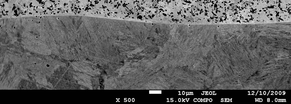 Secondary electron micrograph of the microstructure of NP 60 coating, specimen 3,5/5 The microstructure of melted layers consists of a solid solution of Cr and Fe in Ni matrix forming a dendritic