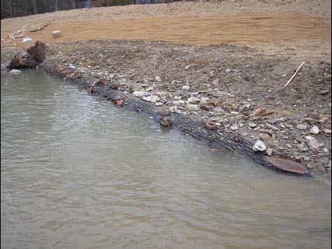 For log vanes, there are 2-3 logs buried behind and below the header log for stability.