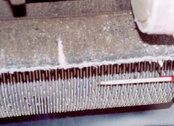 Photo illustrates closeup of diamond grinding blades. Diamond grinding is one technique that can be used to mitigate tire/pavement noise.