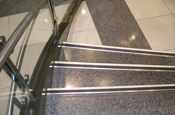2009 IBC/IFC Aluminum Stair Tread Aluminum Stair Nosing - Bull Nosing ITEM NO: BPL307BNA Width 2.169, Specify Custom Length up to 12 Anti-skid stair tread marking, intended for indoor and outdoor.